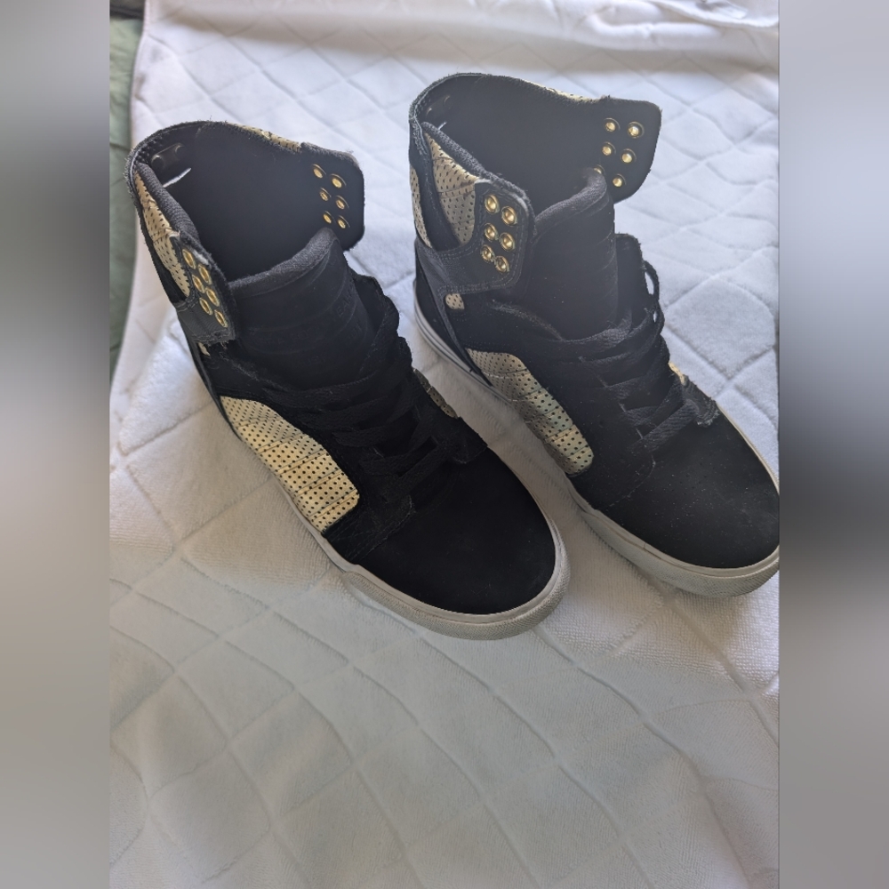 Supra Stylish Black and Gold High-Top Sneakers